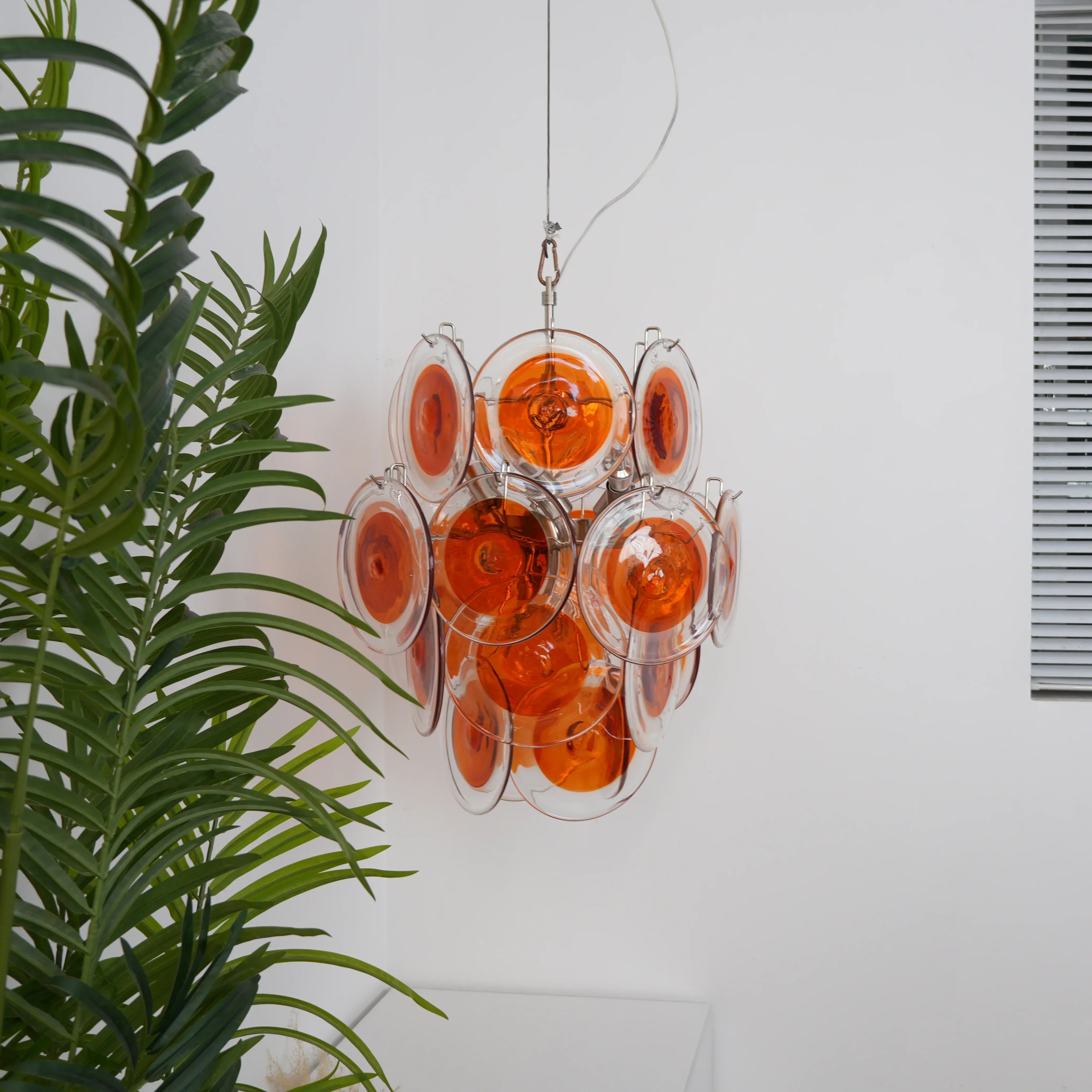elegant-vintage-style-orange-glass-disc-chandelier-for-modern-dining-rooms-and-living-spaces