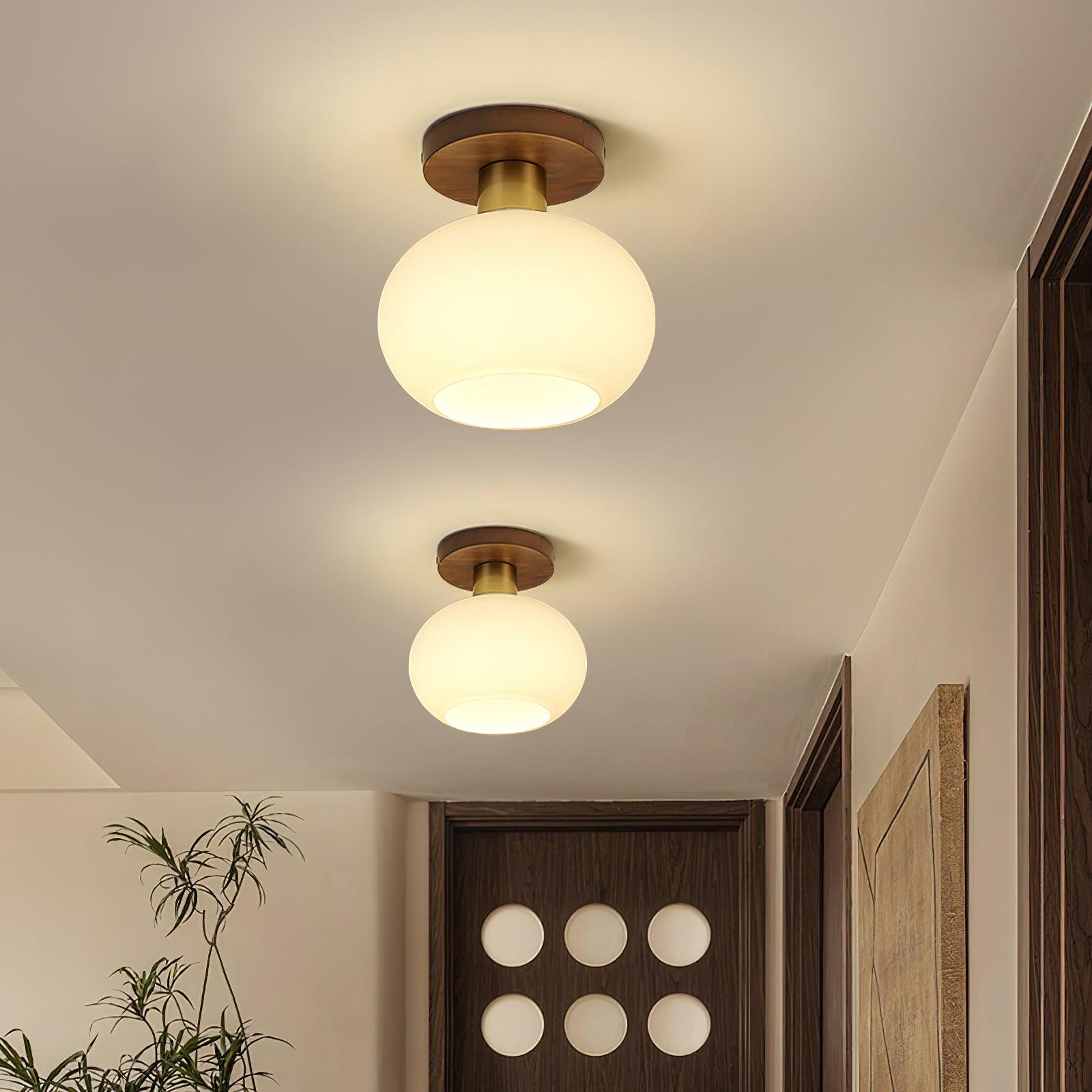 elegant-white-shell-ceiling-lamp-with-black-walnut-wood-base-and-copper-accents