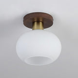 elegant-white-shell-ceiling-lamp-with-black-walnut-wood-base-and-copper-accents
