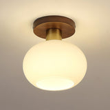 elegant-white-shell-ceiling-lamp-with-black-walnut-wood-base-and-copper-accents