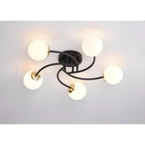 Modern Swirled Metal Flush Mount Light with Elegant Glass Globes for Ambient Bedroom Lighting
