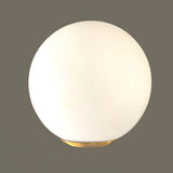 Gingko Leaf Brass Pendant Light Elegant Glass Ball Chandelier for Modern Interior Spaces