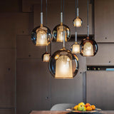 Glo Modern Glass Globe Pendant Light with Metallic Finish for Interior Lighting