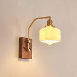 Heritage Walnut Wood Wall Sconce with Glass Shade and Brass Accents