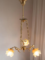 italian-aged-brass-putti-statuette-pendant-light-with-frosted-glass-globes