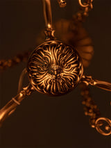 italian-aged-brass-putti-statuette-pendant-light-with-frosted-glass-globes
