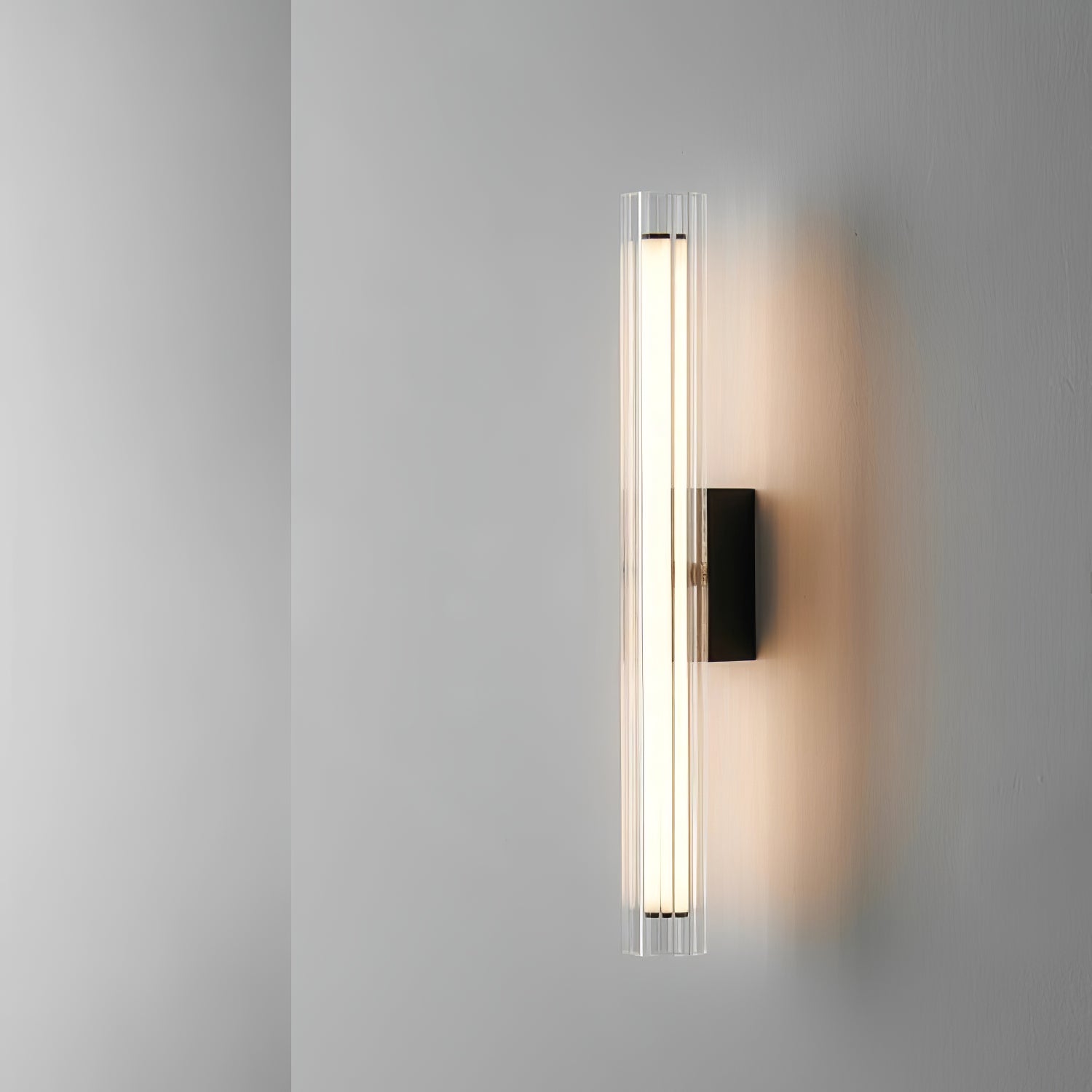 Macie Modern LED Wall Sconce with Textured Glass and Sleek Black Finish for Indoor Lighting