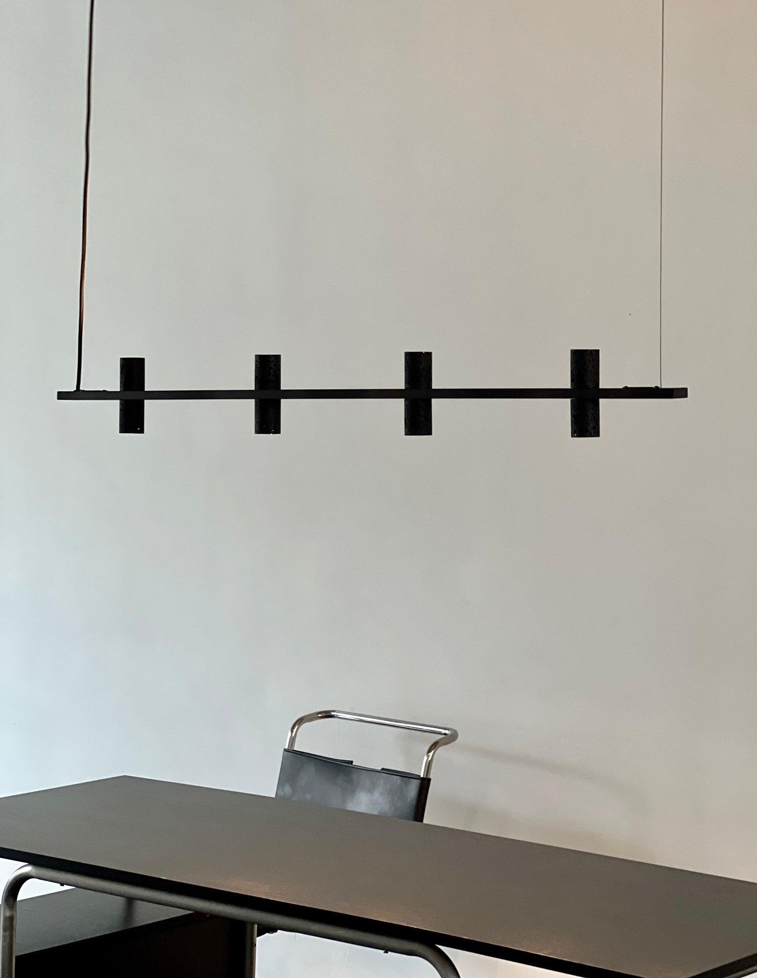 Meta Parallel Modern Linear LED Pendant Light with Natural Black Stone and Copper Accents