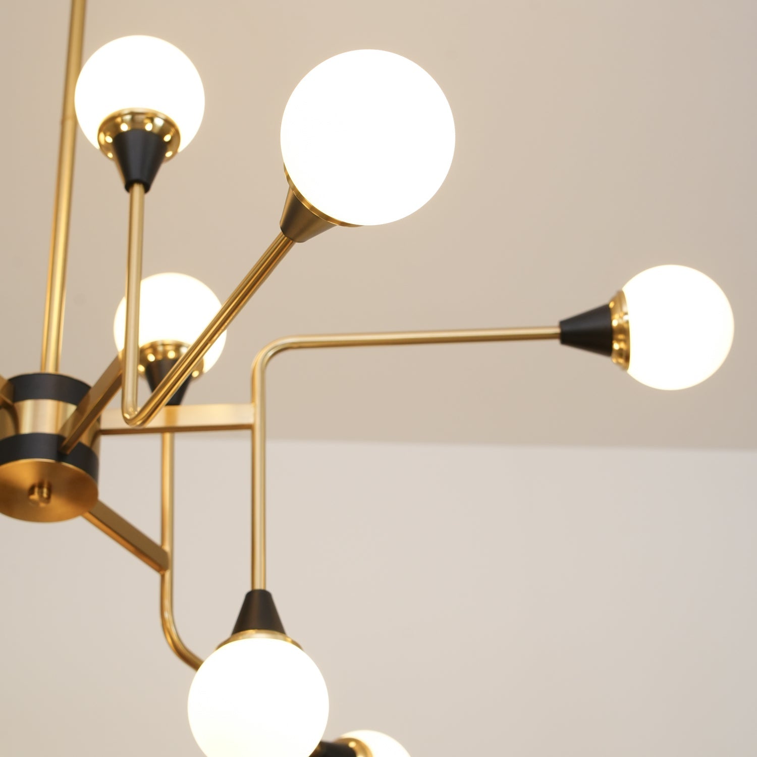 Mid Century Modern Brass Chandelier with Blown White Glass Globes and Bent Arms