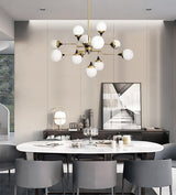 Mid Century Modern Brass Chandelier with Blown White Glass Globes and Bent Arms