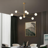 Mid Century Modern Brass Crown Chandelier with White Glass Globe Shades for Indoor Lighting