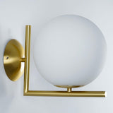 Mid Century Modern Opal Glass Globe Wall Sconce Lamp in Black and Gold