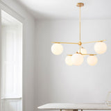 Mid Century Modern Sphere and Stem Chandelier with White Glass Globes and Brass Finish