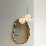 Mid Century Modern Sphere and Stem Chandelier with White Glass Globes and Brass Finish