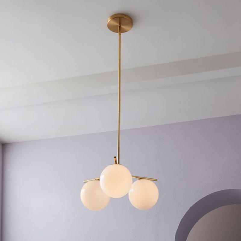 Mid Century Modern Sphere and Stem Chandelier with White Glass Globes and Brass Finish