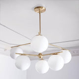 Mid Century Modern Sphere and Stem Chandelier with White Glass Globes and Brass Finish