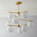 Mid Century Modern Sphere and Stem Chandelier with White Glass Globes and Brass Finish