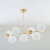 Mid Century Modern Sphere and Stem Chandelier with White Glass Globes and Brass Finish