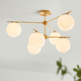 Mid Century Modern Sphere and Stem Chandelier with White Glass Globes and Brass Finish