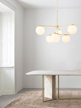 Mid Century Modern Sphere and Stem Chandelier with White Glass Globes and Brass Finish