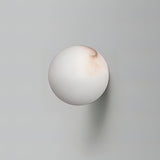 Modern Alabaster Mini Orb Wall Lamp Spherical Natural Stone Sconce for Interior Spaces