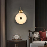 Modern Alabaster Stone Eclipse Wall Sconce with Elegant Brass Accents and Integrated LED Lighting