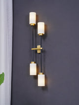 Modern Asymmetric Brass Wall Sconce with Cylindrical Glass Shades for Luxury Interiors