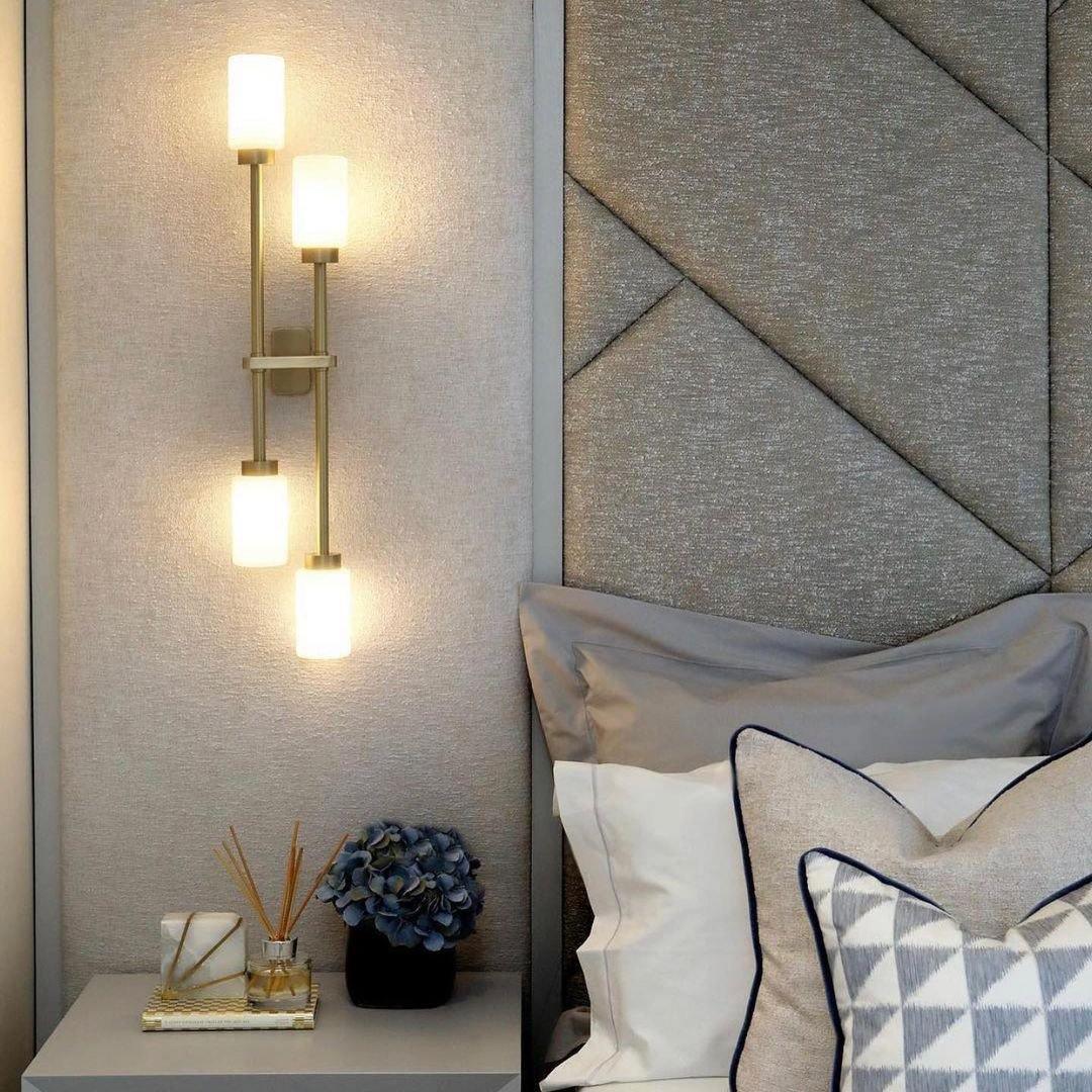 Modern Asymmetric Brass Wall Sconce with Cylindrical Glass Shades for Luxury Interiors