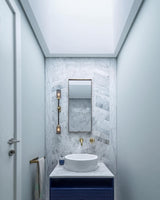 Modern Asymmetric Brass Wall Sconce with Cylindrical Glass Shades for Luxury Interiors