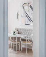 Modern Asymmetric Brass Wall Sconce with Cylindrical Glass Shades for Luxury Interiors