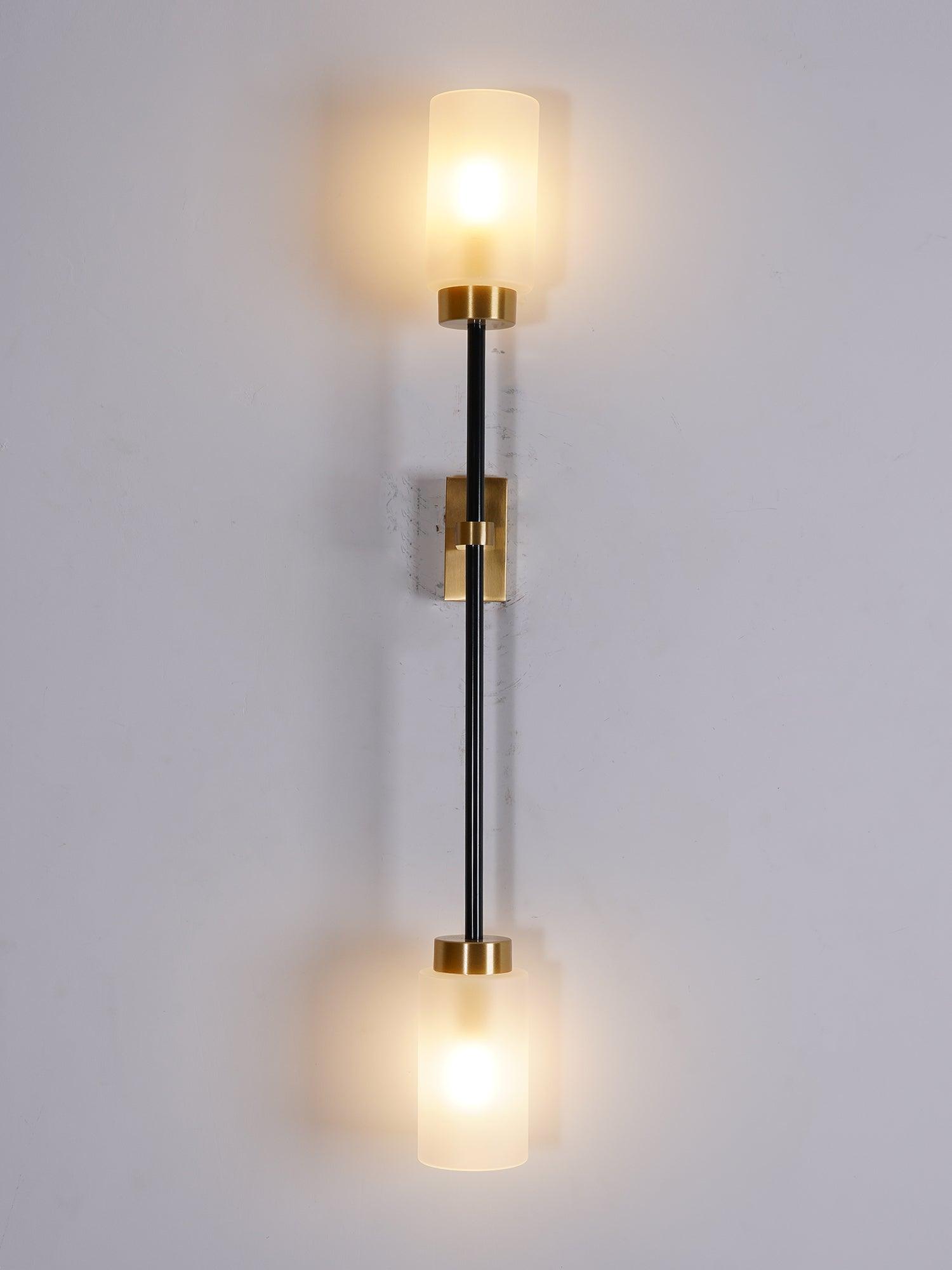 Modern Asymmetric Brass Wall Sconce with Cylindrical Glass Shades for Luxury Interiors