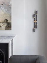Modern Asymmetric Brass Wall Sconce with Cylindrical Glass Shades for Luxury Interiors
