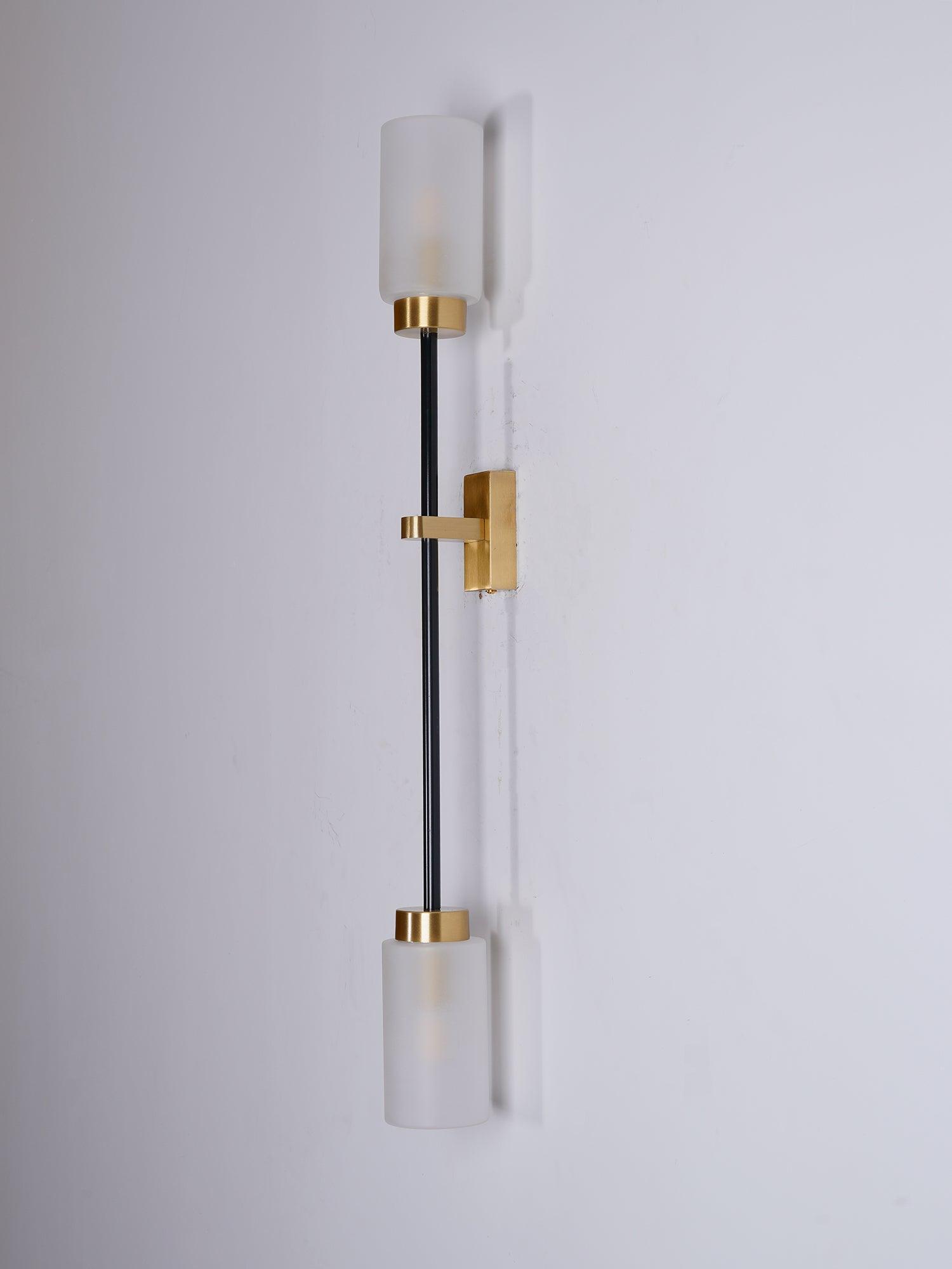 Modern Asymmetric Brass Wall Sconce with Cylindrical Glass Shades for Luxury Interiors
