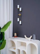 Modern Asymmetric Brass Wall Sconce with Cylindrical Glass Shades for Luxury Interiors