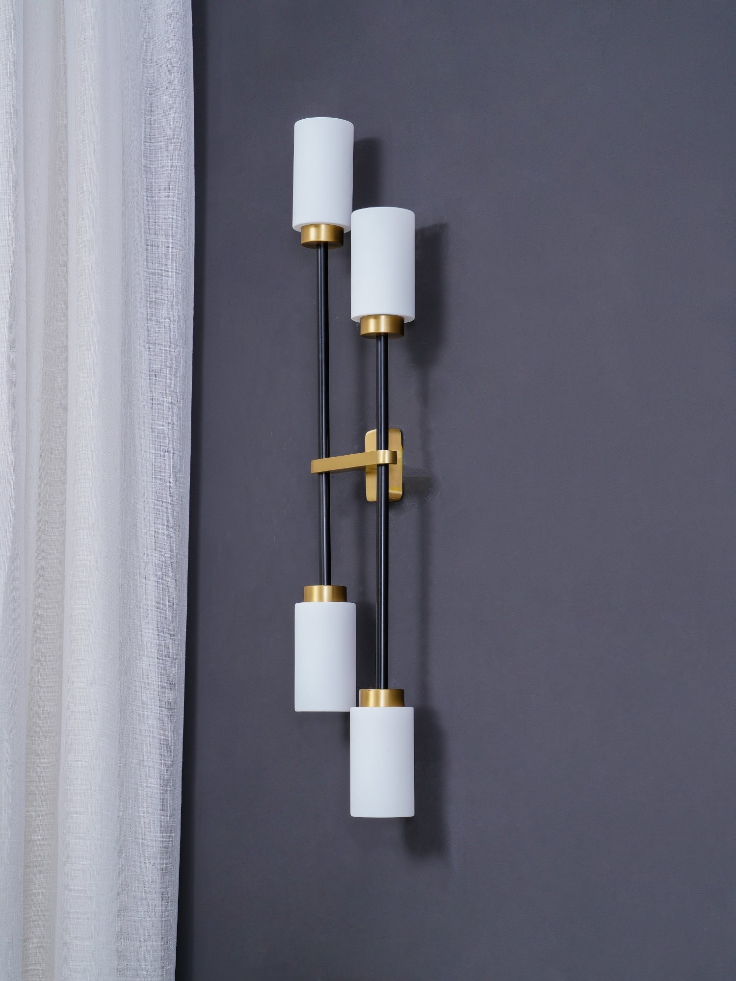Modern Asymmetric Brass Wall Sconce with Cylindrical Glass Shades for Luxury Interiors