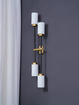 Modern Asymmetric Brass Wall Sconce with Cylindrical Glass Shades for Luxury Interiors
