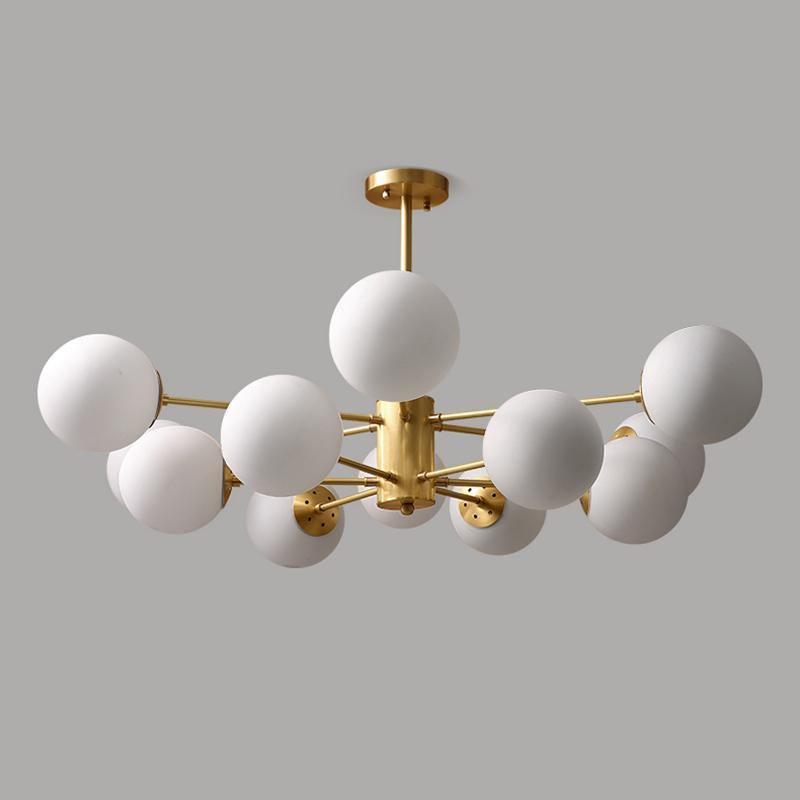 modern-asymmetrical-brass-chandelier-with-opal-glass-globe-shades-for-living-and-dining-rooms