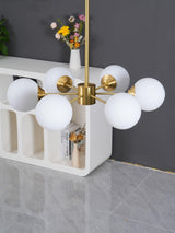modern-asymmetrical-brass-chandelier-with-opal-glass-globe-shades-for-living-and-dining-rooms