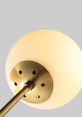 modern-asymmetrical-brass-chandelier-with-opal-glass-globe-shades-for-living-and-dining-rooms