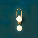 Modern Belisto Gold Wall Lamp with Oval Metal Frame and White Glass Globe Shade
