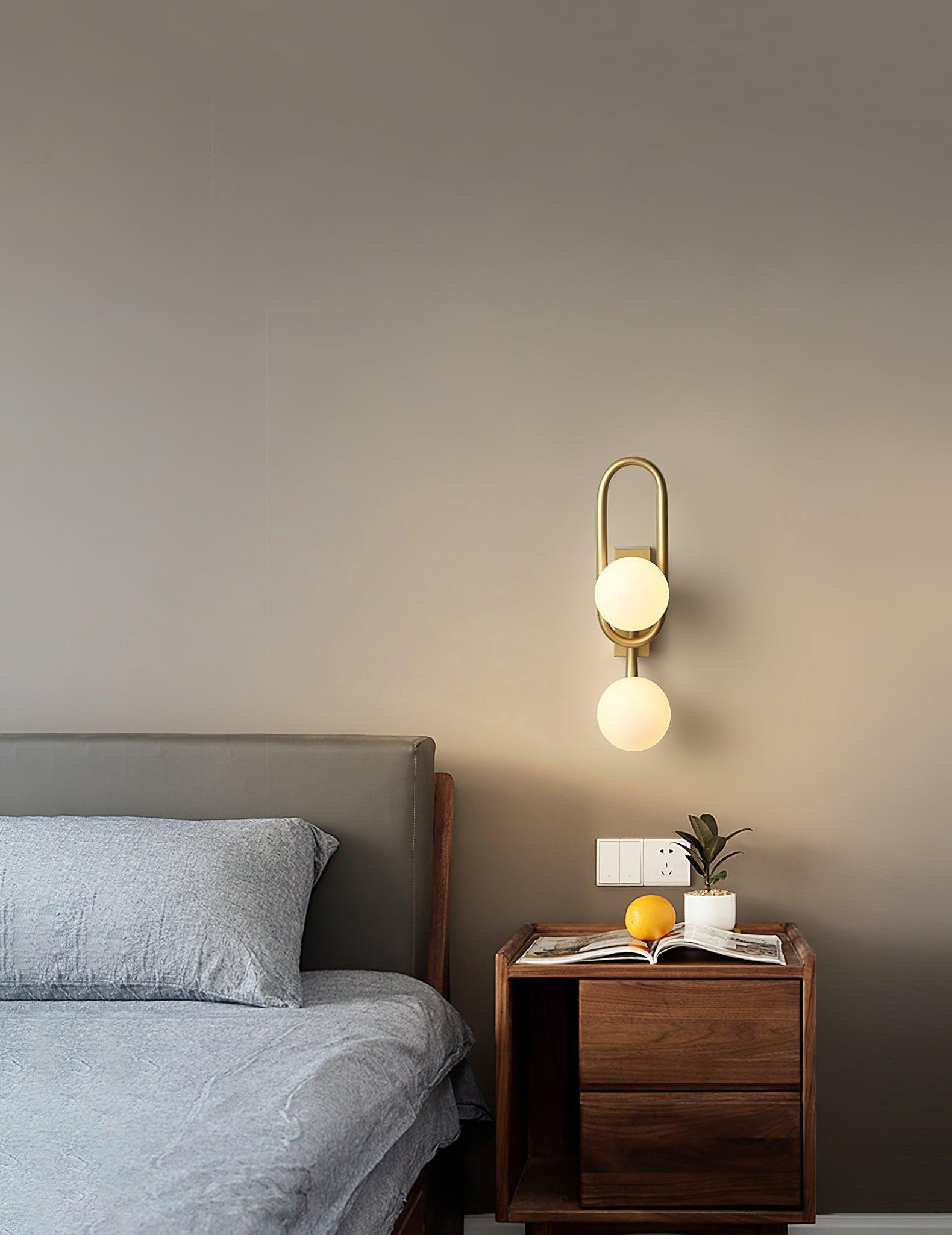 Modern Belisto Gold Wall Lamp with Oval Metal Frame and White Glass Globe Shade