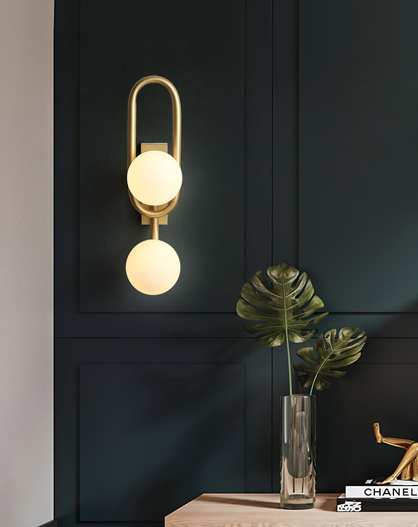 Modern Belisto Gold Wall Lamp with Oval Metal Frame and White Glass Globe Shade