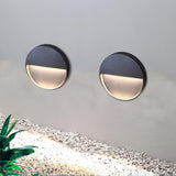 Modern Black Circular LED Outdoor Step Light and Exterior Wall Sconce for Patios and Stairways