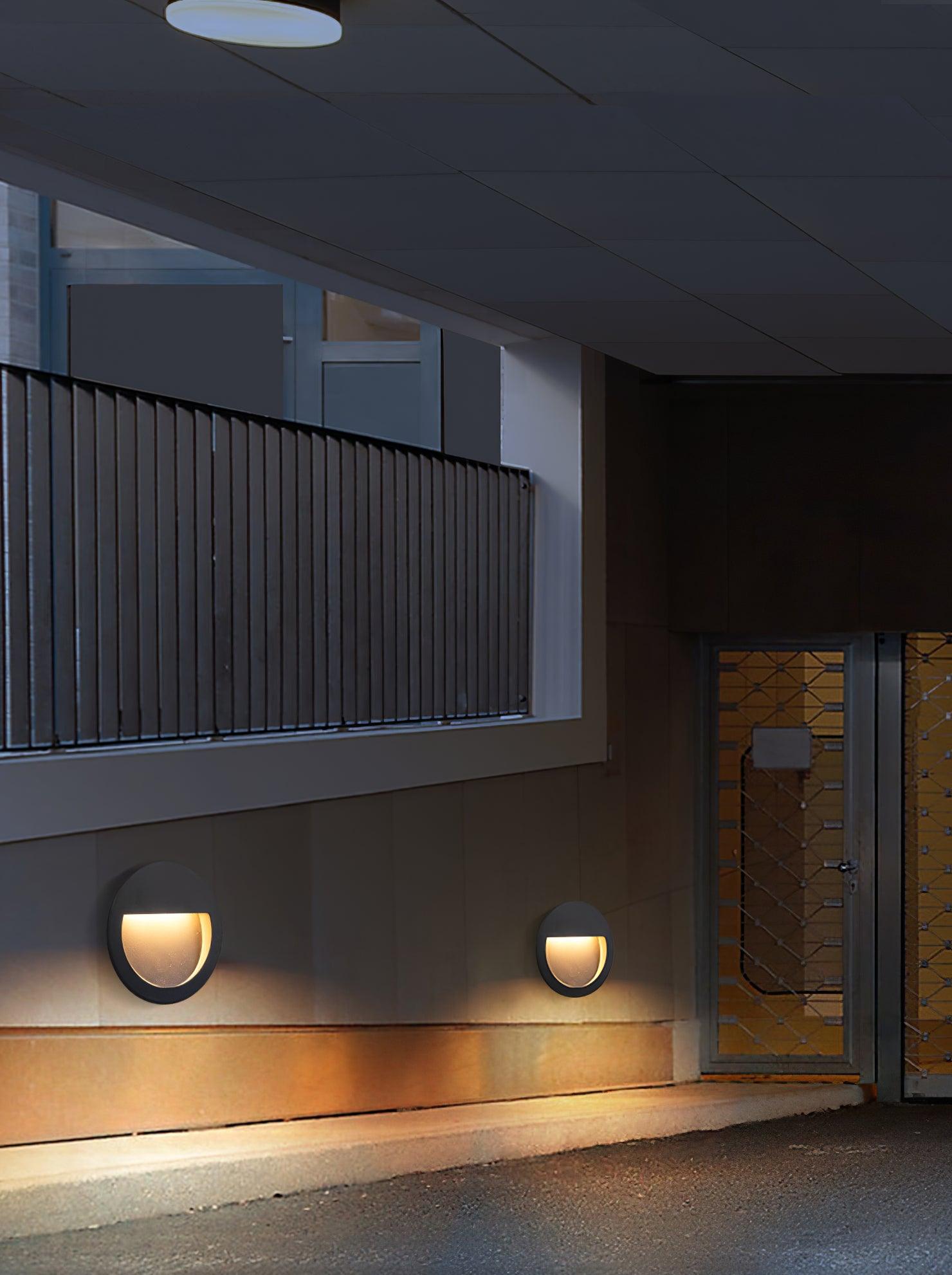 Modern Black Circular LED Outdoor Step Light and Exterior Wall Sconce for Patios and Stairways