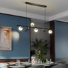 Modern Black Linear Island Chandelier with Acrylic Globe Shades and Spotlights for Kitchen Dining Room
