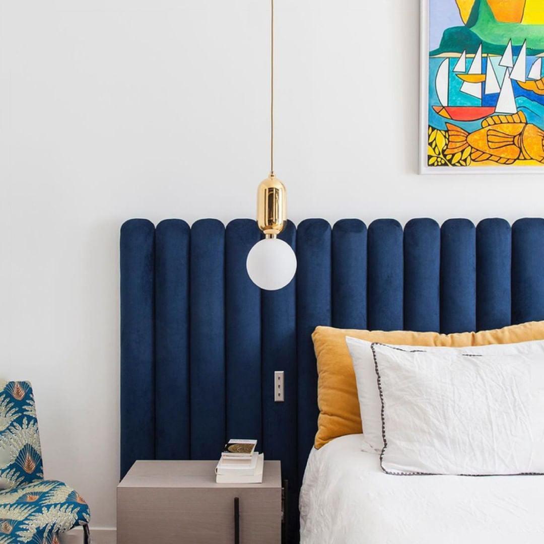 Modern Blown Glass Pendant Light with Minimalist Metal Frame for Contemporary Indoor Spaces