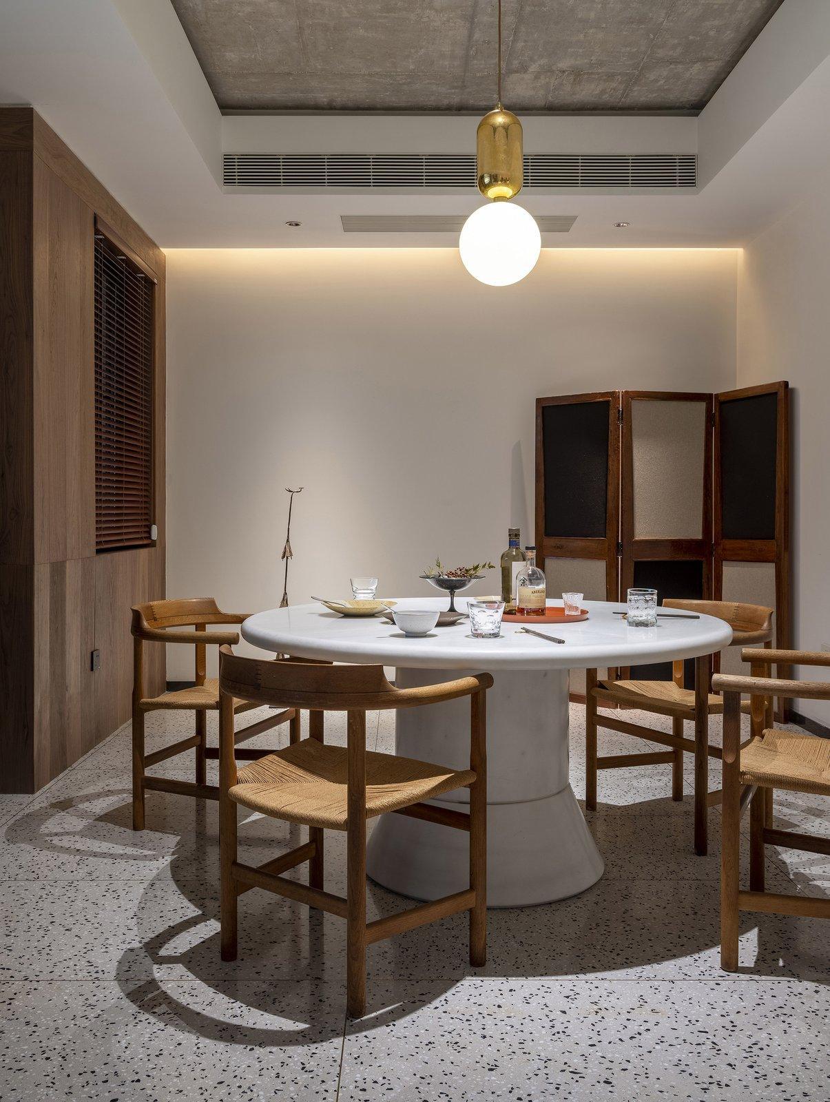 Modern Blown Glass Pendant Light with Minimalist Metal Frame for Contemporary Indoor Spaces