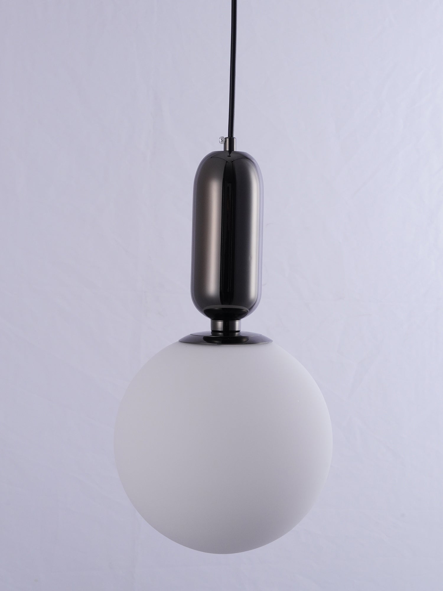 Modern Blown Glass Pendant Light with Minimalist Metal Frame for Contemporary Indoor Spaces