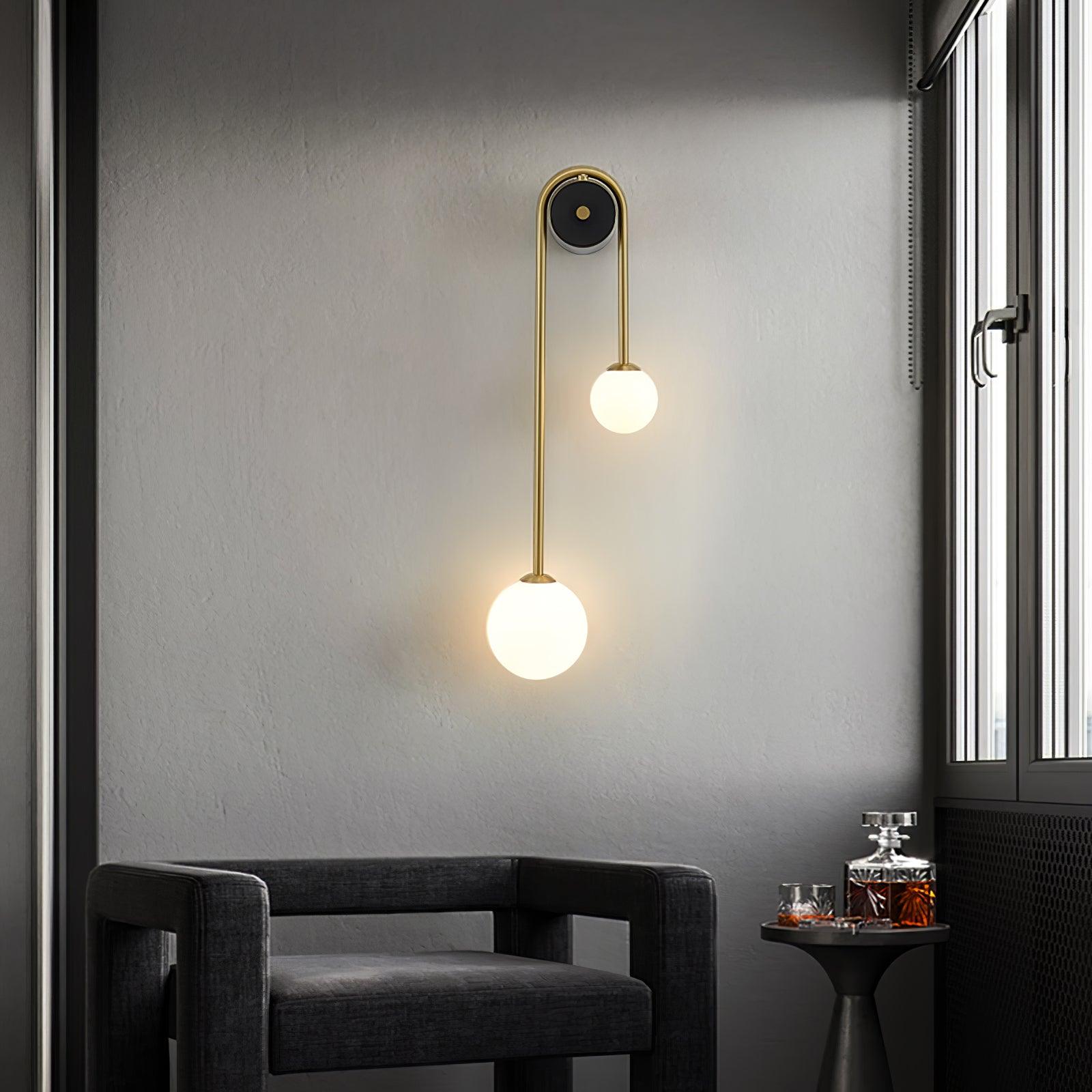 Modern Brass Curved Wall Sconce with Dual White Glass Globes for Living Room and Bedroom