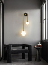 Modern Brass Curved Wall Sconce with Dual White Glass Globes for Living Room and Bedroom